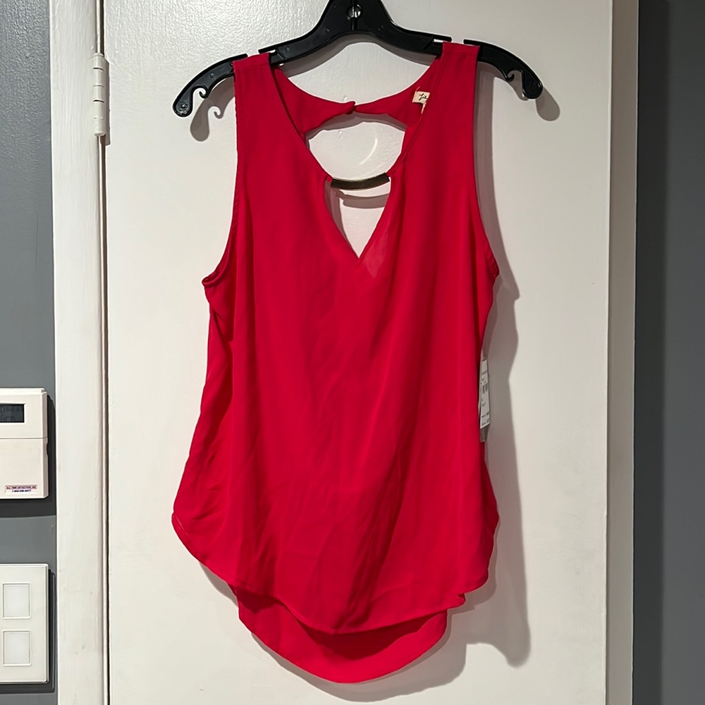 Brand new Lily White tank size XL